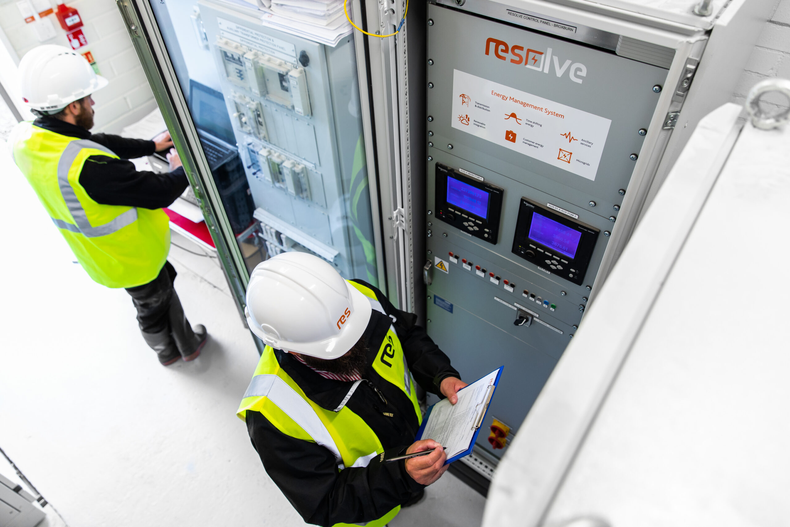 People completiing checks with RESolve system in battery unit